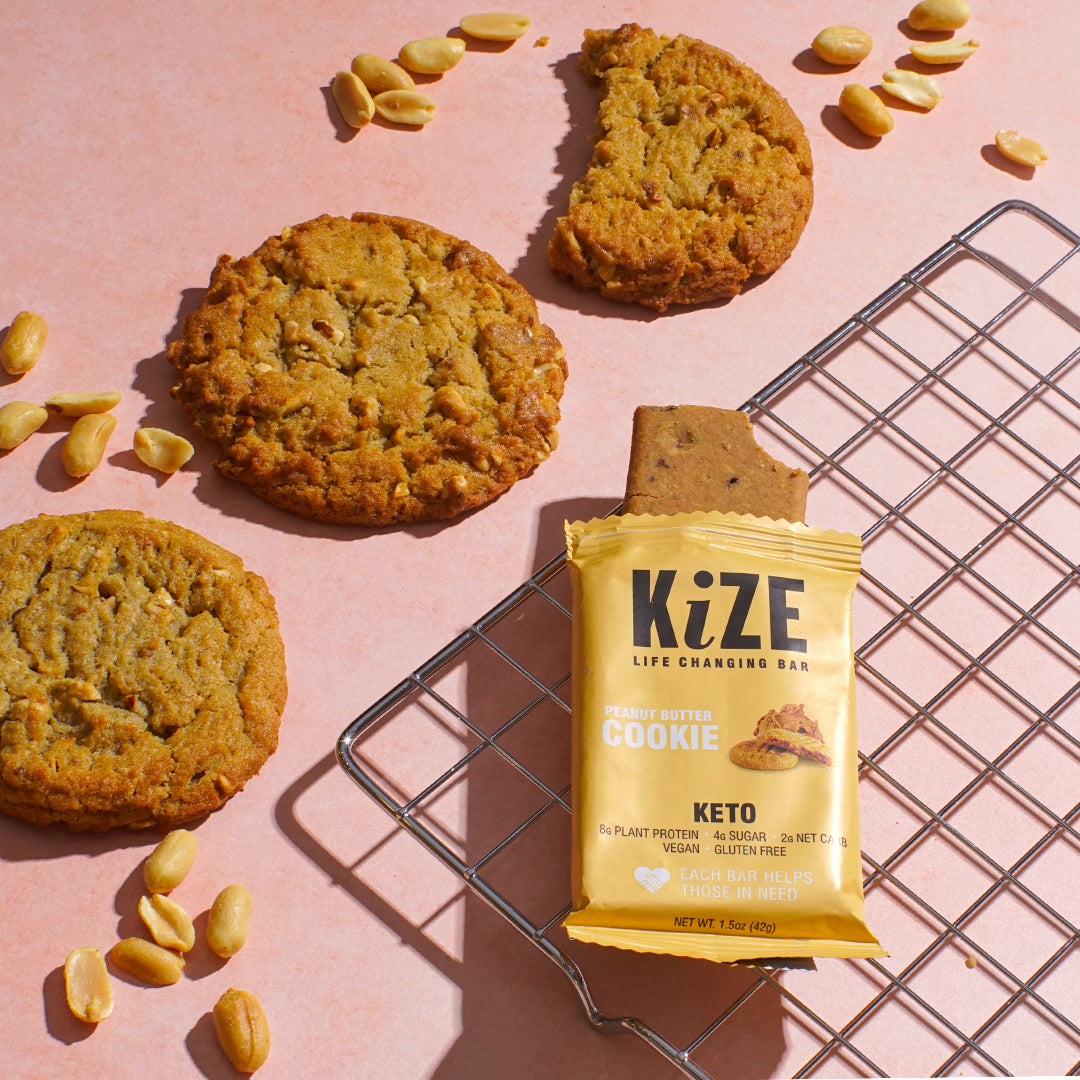 Peanut butter cookies, Kize keto bar packaging, peanuts, pink background