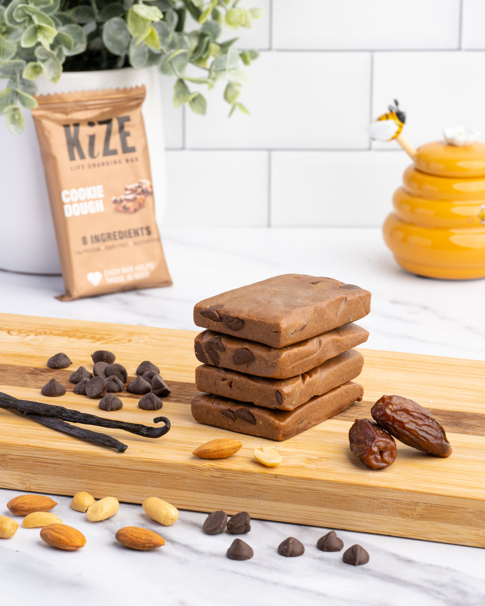 Cookie Dough Kize Protein Bar Stacked on Counter